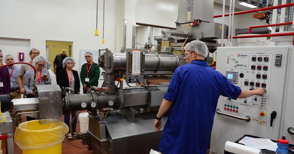 Working the extruder at the pilot plant