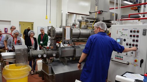 Working the extruder at the pilot plant